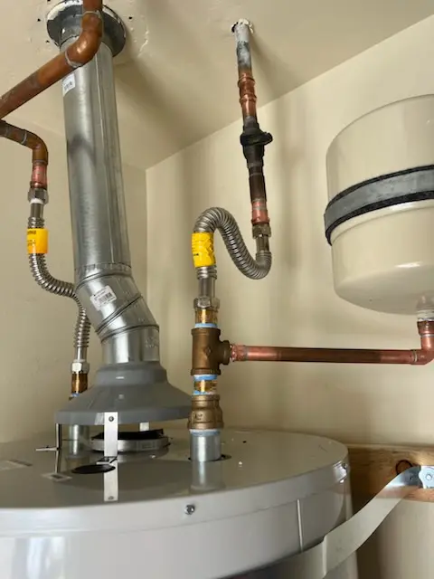 Water heater installation and plumbing repair in Trapp
